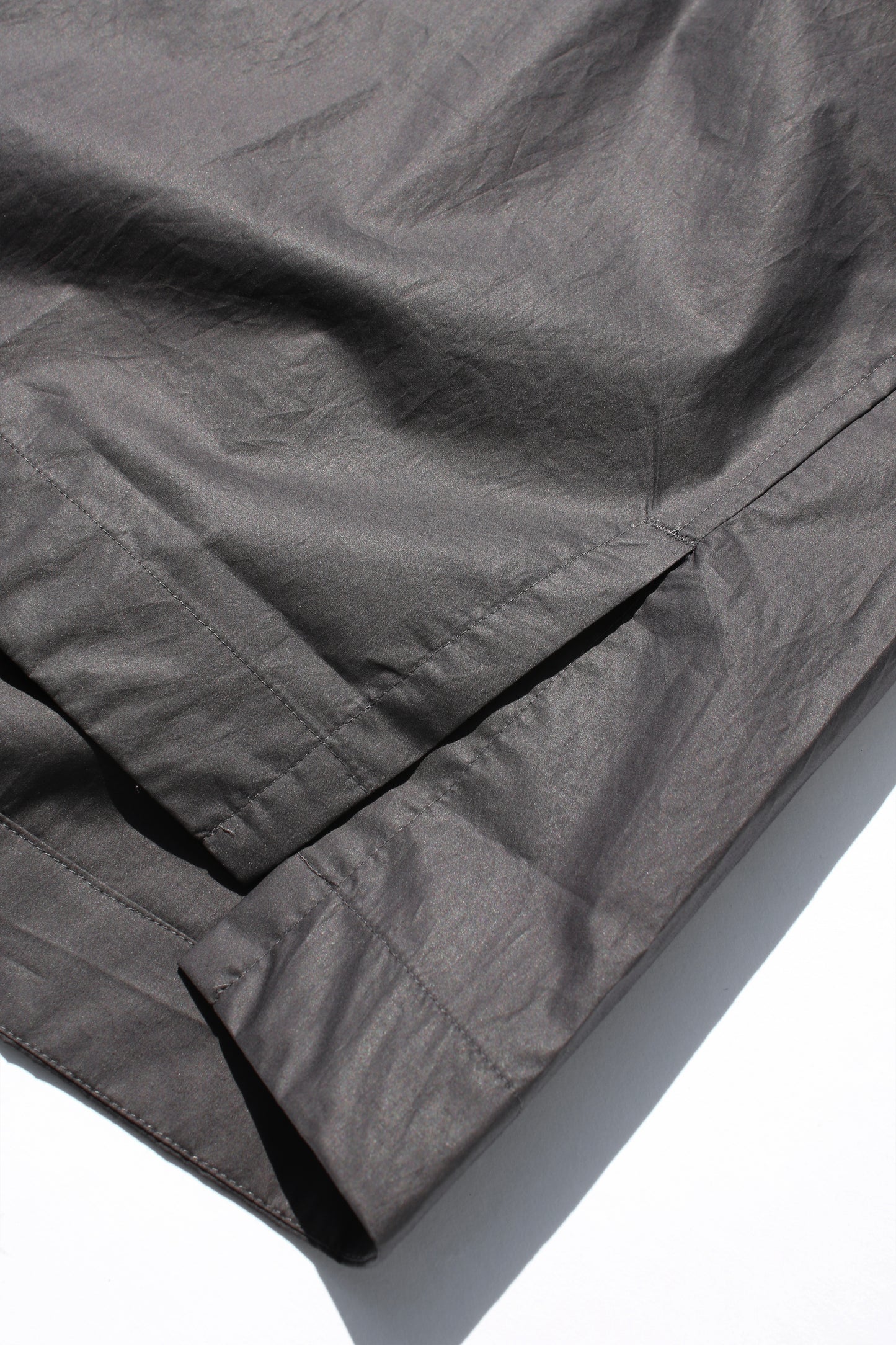 O PROJECT COATED TYPEWRITER WOVEN TEE - DARK GREY