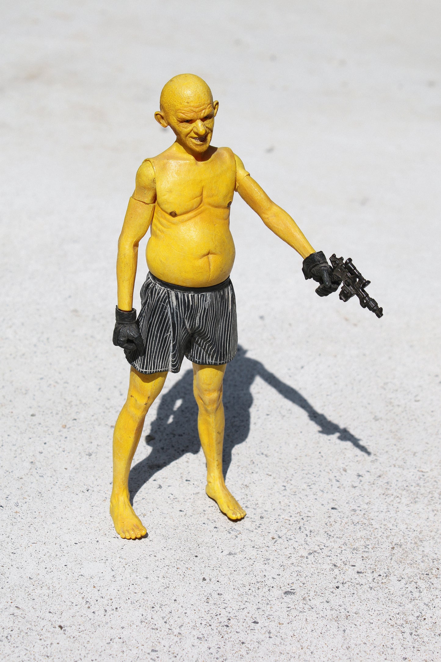 SIN CITY YELLOW BASTARD NECA