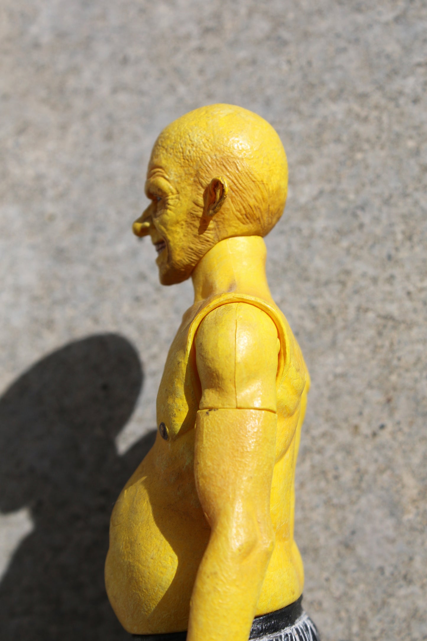 SIN CITY YELLOW BASTARD NECA