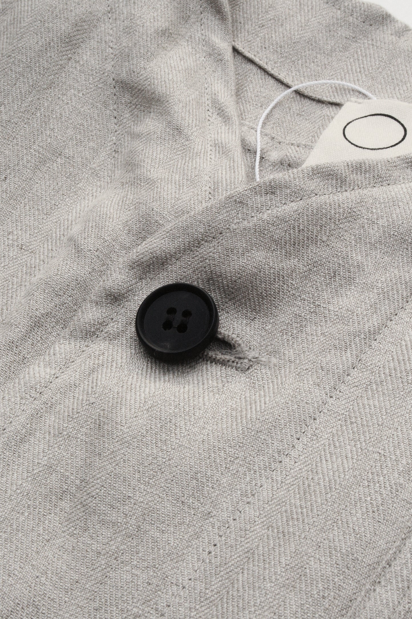 O PROJECT DENSE HERRINGBONE SLEEVELESS JACKET - KINARI