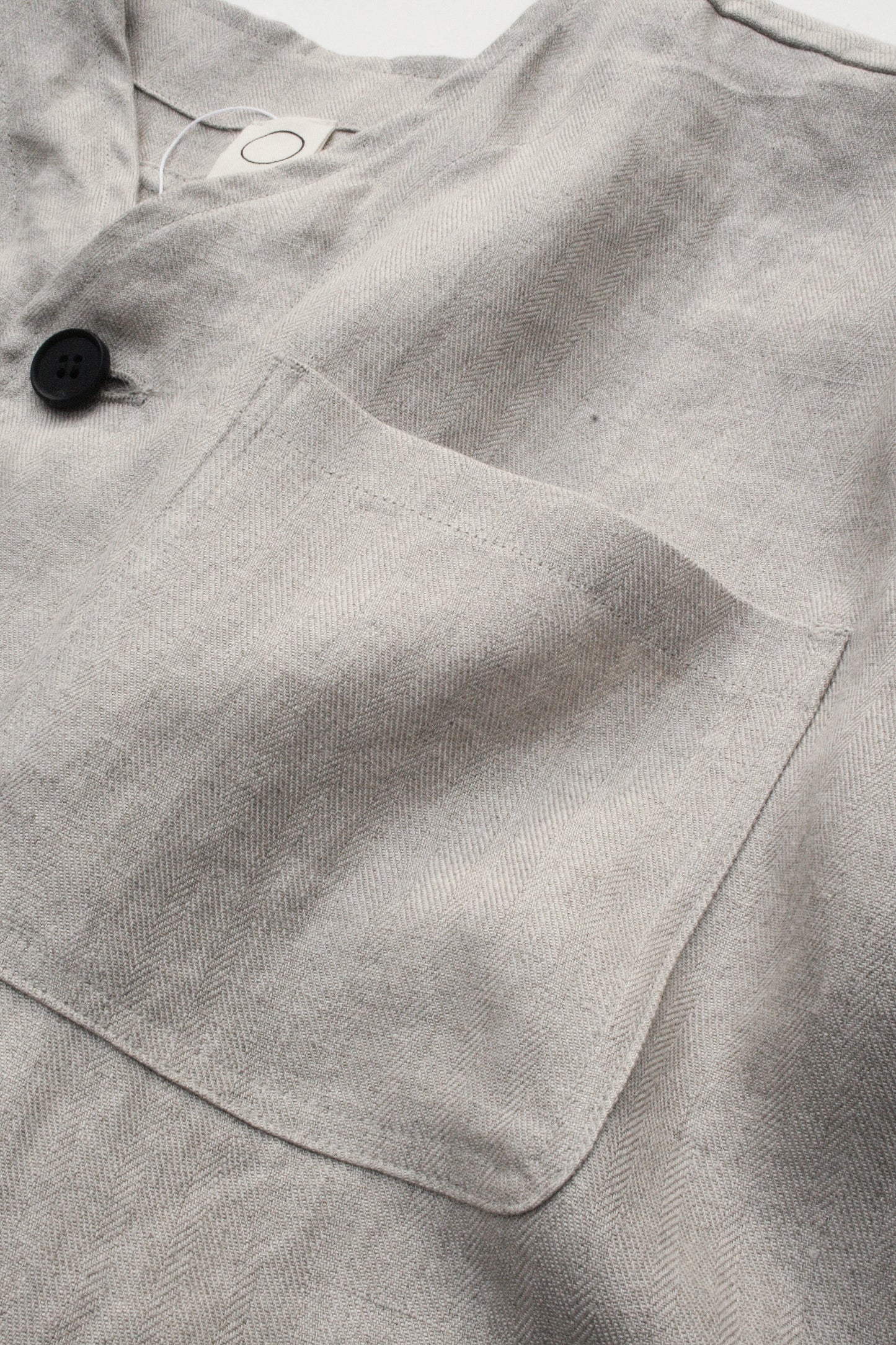 O PROJECT DENSE HERRINGBONE SLEEVELESS JACKET - KINARI