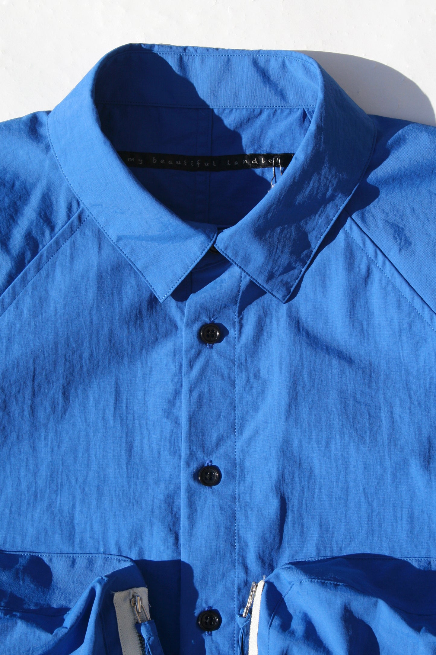 MY BEAUTIFUL LANDLET NYLON DYED TAFFETA BIG POCKET SHIRT - BLUE