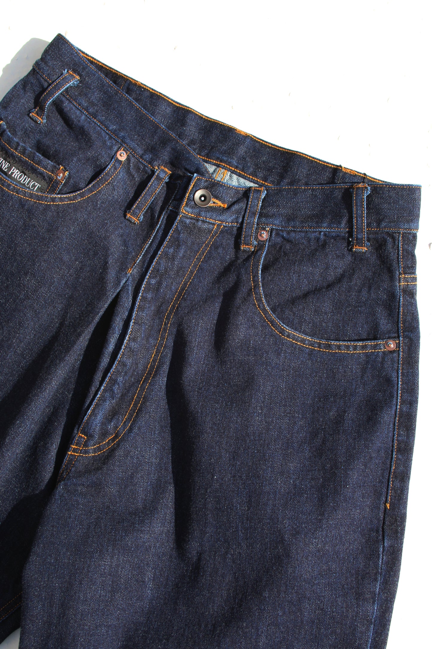 ESSAY BAGGY TUCKED JEANS - INDIGO