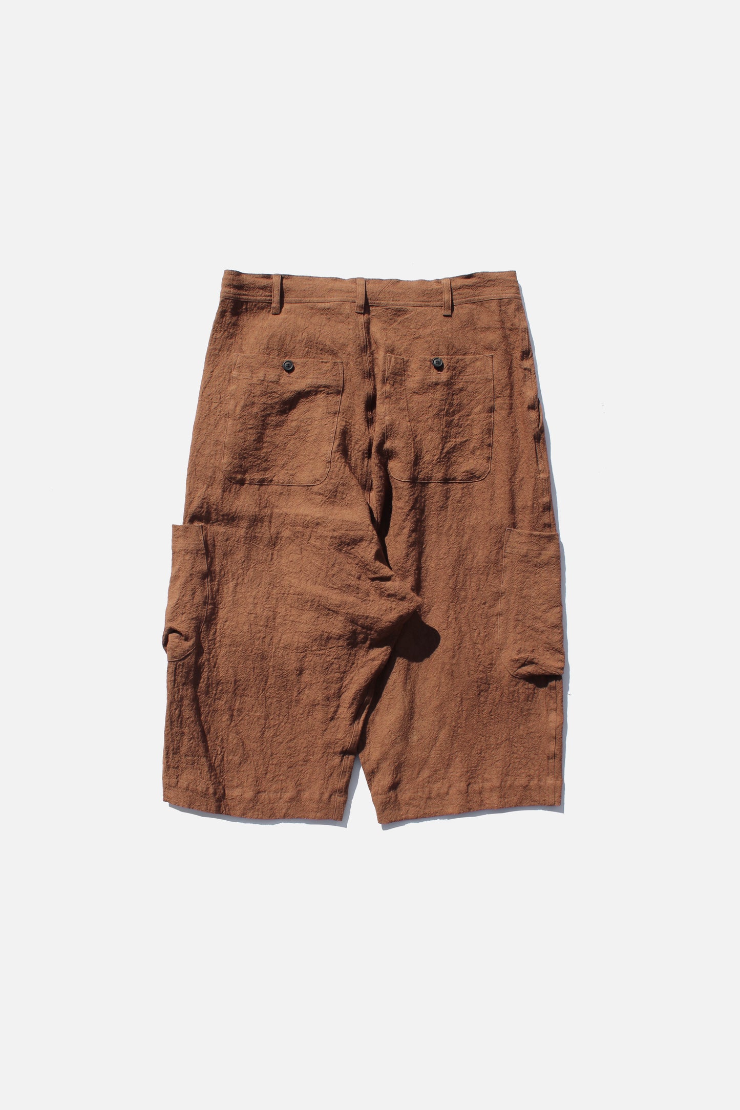 O PROJECT NAT DYED LT CANVAS CROPPED CARGO PANTS - KAKISHIBU